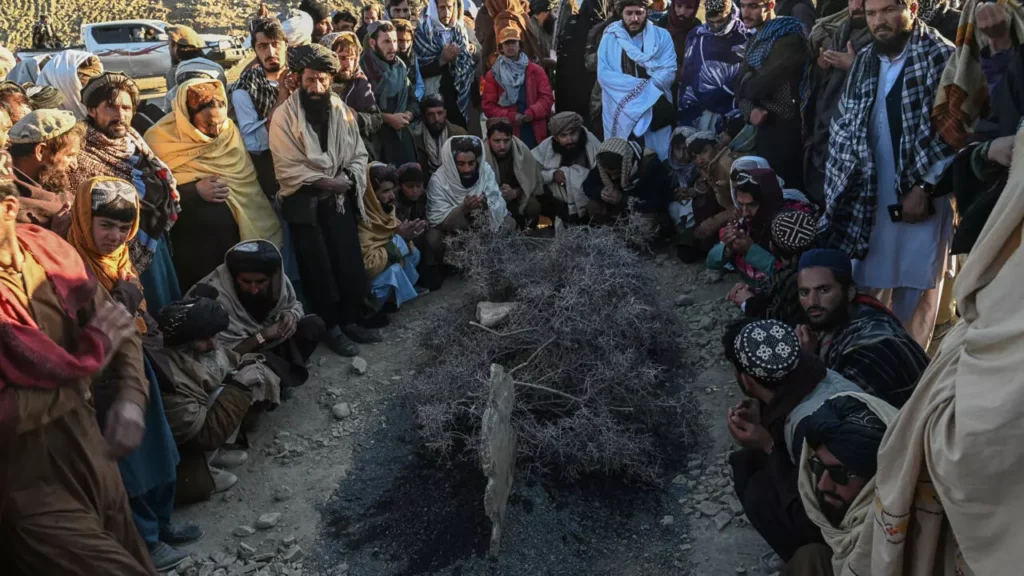 Thousands attend Khalil Ur-Rahman Haqqani's funeral in Paktia after the Afghan minister's tragic death in Kabul bombing. [Image via AFP]