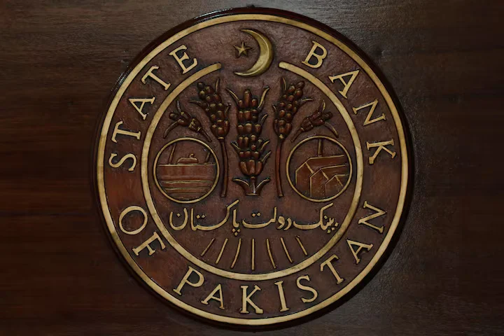 Pakistan cuts key policy rate by 200 bps to 13%, marking its fifth reduction in 2024 to support economic recovery. [Image via Reuters/File]