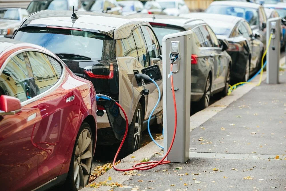 Pakistan plans to shift 30% of vehicles to electric by 2030, boosting EV infrastructure and reducing carbon emissions. [Image via The Frontier Post]